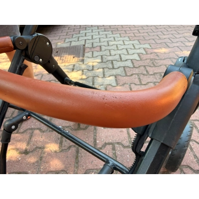 Oryginalna barierka (pałąk) w kolorze koniakowym do wózka Baby Design Look Air – część używana